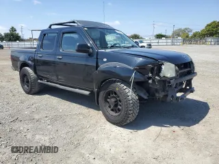 2004 Nissan Frontier XE with VIN 1N6ED27T84C446811, listed as a Copart auction lot 54988415 with 172,655 mi miles and Salvage title. Bid and sale history available at DreamBid. Image 4.