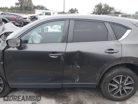 2018 Mazda CX-5 Touring with VIN JM3KFBCM0J0312958, listed as a IAAI auction lot 41565238 with 1 mi miles. Bid and sale history available at carsss.com. Image 14.