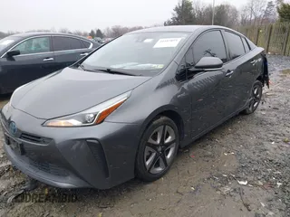 2019 Toyota Prius L Eco z VIN JTDKARFU8K3085918, wystawiony jako IAAI lot #41107891 z przebiegiem 166 295 mil mil oraz . Historia ofert i sprzedaży dostępna na DreamBid. Obrazek 2.