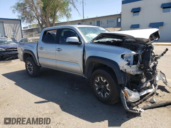 2022 Toyota Tacoma SR with VIN 3TMCZ5AN4NM470997, listed as a Copart auction lot 55165855 with 67,161 mi miles and Salvage title. Bid and sale history available at DreamBid. Image 4.