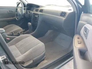 2000 Toyota Camry CE z VIN JT2BG22KXY0406984, wystawiony jako IAAI lot #42344436 z przebiegiem 234 729 mil mil oraz . Historia ofert i sprzedaży dostępna na DreamBid. Obrazek 5.