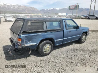 1989 Mitsubishi Mighty Max z VIN JA7FL24D7KP055207, wystawiony jako Copart lot #53172405 z przebiegiem 118 439 mil mil oraz Szkoda całkowita • Salvage title. Historia ofert i sprzedaży dostępna na DreamBid. Obrazek 3.