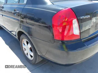 2007 Hyundai Accent GLS with VIN KMHCN46C67U091183, listed as a IAAI auction lot 42564425 with 160,190 mi miles and . Bid and sale history available at DreamBid. Image 6.