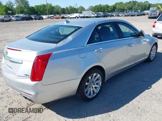 2014 Cadillac CTS Luxury AWD with VIN 1G6AX5S34E0124464, listed as a IAAI auction lot 42298607 with 89,351 mi miles and . Bid and sale history available at DreamBid. Image 4.