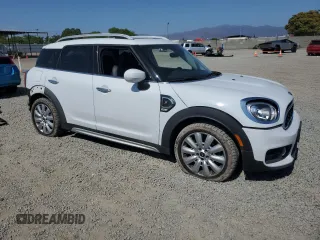 2020 MINI Countryman Cooper S with VIN WMZYW7C01L3L86999, listed as a Copart auction lot 60845345 with 74,438 mi miles and Salvage title. Bid and sale history available at DreamBid. Image 4.