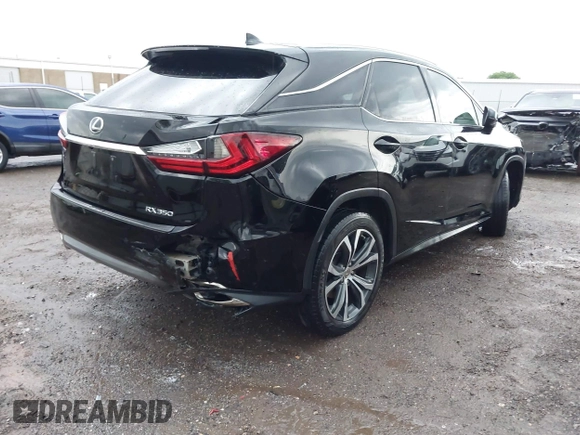 2016 Lexus RX 350 z VIN 2T2ZZMCA6GC005692, wystawiony jako IAAI lot #42147337 z przebiegiem 132 363 mil mil oraz . Historia ofert i sprzedaży dostępna na DreamBid. Obrazek 4.
