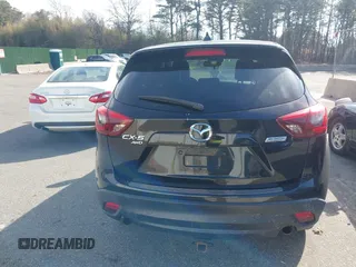 2016 Mazda CX-5 Grand Touring with VIN JM3KE4DY5G0681436, listed as a IAAI auction lot 41664780 with 172,199 mi miles. Bid and sale history available at carsss.com. Image 16.