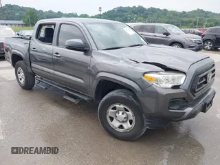 2021 Toyota Tacoma SR with VIN 5TFAX5GN3MX194566, listed as a IAAI auction lot 42377782 with 50,868 mi miles and . Bid and sale history available at DreamBid. Image 1.