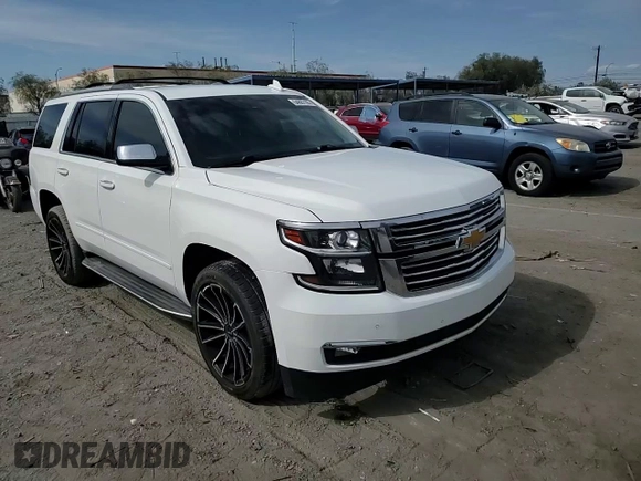 2018 Chevrolet Tahoe Premier with VIN 1GNSKCKC6JR195246, listed as a Copart auction lot 54887165 with 135,973 mi miles and Salvage title. Bid and sale history available at DreamBid. Image 14.