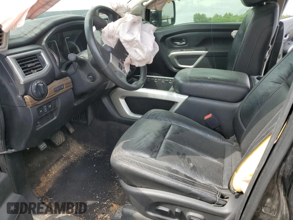 2016 Nissan Titan SL z VIN 1N6BA1F22GN504550, wystawiony jako Copart lot #56616955 z przebiegiem 176 020 mil mil oraz Szkoda całkowita • Salvage title. Historia ofert i sprzedaży dostępna na DreamBid. Obrazek 7.