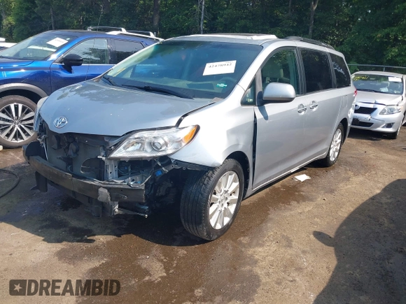 2014 Toyota Sienna Limited with VIN 5TDDK3DC0ES087274, listed as a IAAI auction lot 42478942 with 102,265 mi miles and . Bid and sale history available at DreamBid. Image 2.