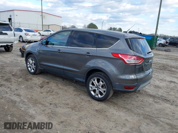 2013 Ford Escape SEL with VIN 1FMCU0HX8DUD68360, listed as a IAAI auction lot 41427968 with 129,067 mi miles. Bid and sale history available at carsss.com. Image 3.