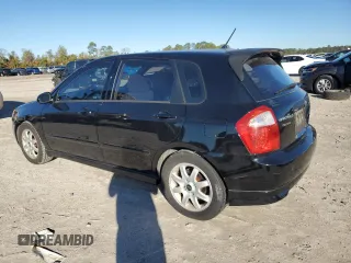 2005 Kia Spectra with VIN KNAFE161355073968, listed as a Copart auction lot 84543784 with 166,858 mi miles and Salvage Title. Bid and sale history available at carsss.com. Image 2.