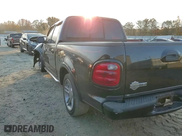 2002 Ford F-150 Harley Davidson with VIN 1FTRW07342KC24210, listed as a Copart auction lot 78489224 with 203,508 mi miles and Salvage Title. Bid and sale history available at carsss.com. Image 11.