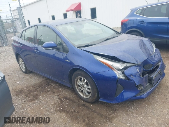 2016 Toyota Prius Two z VIN JTDKBRFU3G3511809, wystawiony jako IAAI lot #42295946 z przebiegiem 118 621 mil mil oraz . Historia ofert i sprzedaży dostępna na DreamBid. Obrazek 1.