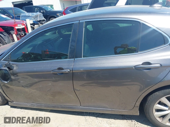 2019 Toyota Camry LE z VIN 4T1B11HK4KU797720, wystawiony jako IAAI lot #42053830 z przebiegiem 102 558 mil mil oraz . Historia ofert i sprzedaży dostępna na DreamBid. Obrazek 14.