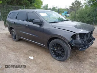 2015 Dodge Durango SXT with VIN 1C4RDJAG0FC947060, listed as a IAAI auction lot 42505938 with 124,705 mi miles and . Bid and sale history available at DreamBid. Image 1.