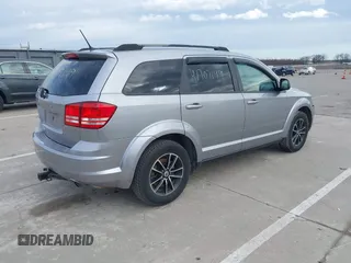 2018 Dodge Journey SE with VIN 3C4PDCABXJT295391, listed as a IAAI auction lot 41707149 with 134,221 mi miles. Bid and sale history available at carsss.com. Image 4.