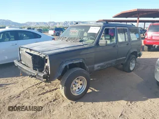 1994 Jeep Cherokee Country z VIN 1J4FJ78S9RL193633, wystawiony jako IAAI lot #42128672 z przebiegiem 231 430 mil mil oraz . Historia ofert i sprzedaży dostępna na DreamBid. Obrazek 2.