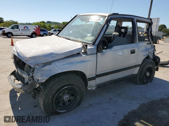1991 Geo Tracker z VIN 2CNBJ18U3M6909006, wystawiony jako Copart lot #73638944 z przebiegiem 65 033 mil mil oraz Tytuł czysty. Historia ofert i sprzedaży dostępna na DreamBid. Obrazek 1.