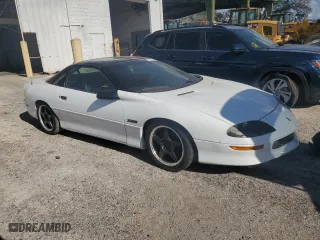 1996 Chevrolet Camaro Z28 with VIN 2G1FP22P2T2119028, listed as a Copart auction lot 74322894 with 124,545 mi miles and Salvage Title. Bid and sale history available at carsss.com. Image 4.