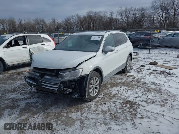 2019 Volkswagen Tiguan SE with VIN 3VV3B7AX7KM040136, listed as a IAAI auction lot 41397714 with 82,302 mi miles and . Bid and sale history available at DreamBid. Image 18.