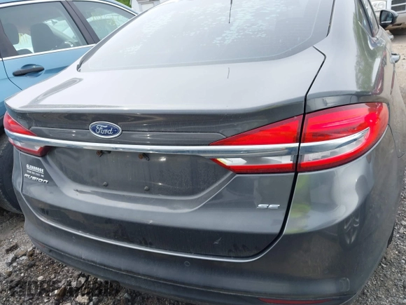 2017 Ford Fusion SE with VIN 3FA6P0H74HR125124, listed as a IAAI auction lot 42169417 with 121,069 mi miles and . Bid and sale history available at DreamBid. Image 16.