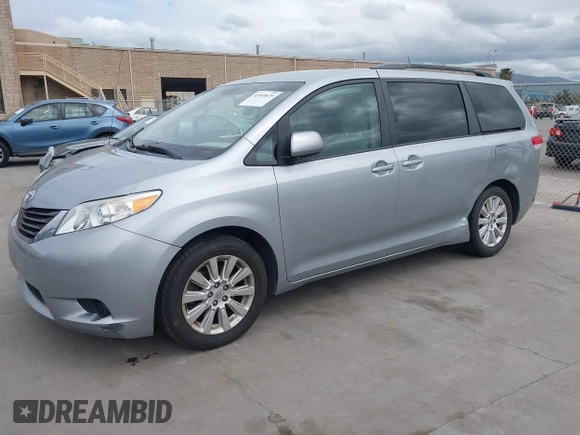 2014 Toyota Sienna LE with VIN 5TDJK3DC1ES080711, listed as a IAAI auction lot 41910679 with 118,788 mi miles and . Bid and sale history available at DreamBid. Image 18.