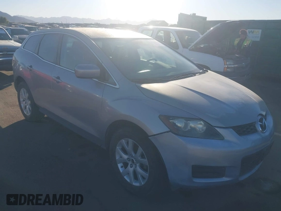 2009 Mazda CX-7 Sport with VIN JM3ER293190233927, listed as a IAAI auction lot 41054654 with 103,137 mi miles. Bid and sale history available at carsss.com. Image 1.