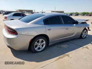 2015 Dodge Charger SE with VIN 2C3CDXBG1FH740962, listed as a Copart auction lot 52035565 with 241,253 mi miles and Salvage Title. Bid and sale history available at carsss.com. Image 3.