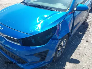 2023 Kia Rio S with VIN 3KPA25AD9PE514279, listed as a IAAI auction lot 42194256 with 76,630 mi miles and . Bid and sale history available at DreamBid. Image 6.
