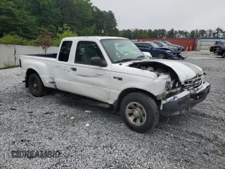 2002 Ford Ranger XL Fleet with VIN 1FTYR44U82TA21001, listed as a Copart auction lot 58392305 with 234,824 mi miles and Salvage title. Bid and sale history available at DreamBid. Image 4.