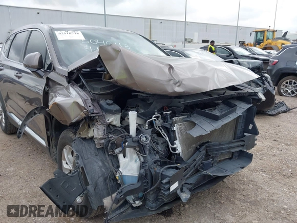 2019 Hyundai Santa Fe SE z VIN 5NMS23AD2KH014037, wystawiony jako IAAI lot #42110778 z przebiegiem 48 975 mil mil oraz . Historia ofert i sprzedaży dostępna na DreamBid. Obrazek 6.
