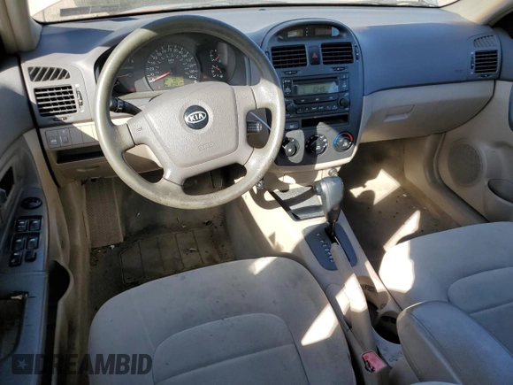 2006 Kia Spectra EX z VIN KNAFE121365269433, wystawiony jako Copart lot #56634735 z przebiegiem 86 551 mil mil oraz Szkoda całkowita • Salvage title. Historia ofert i sprzedaży dostępna na DreamBid. Obrazek 8.