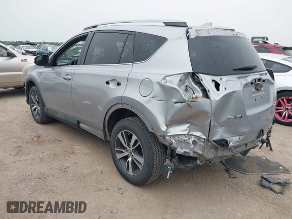 2018 Toyota RAV4 XLE с VIN 2T3WFREV0JW409842, выставлен на аукционе IAAI как лот 42057521 с пробегом 145 915 миль миль и . История ставок и продаж доступна на DreamBid. Изображение 3.