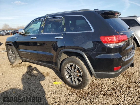 2018 Jeep Grand Cherokee Limited with VIN 1C4RJFBG0JC298468, listed as a Copart auction lot 82975214 with 57,499 mi miles and Salvage Title. Bid and sale history available at carsss.com. Image 2.