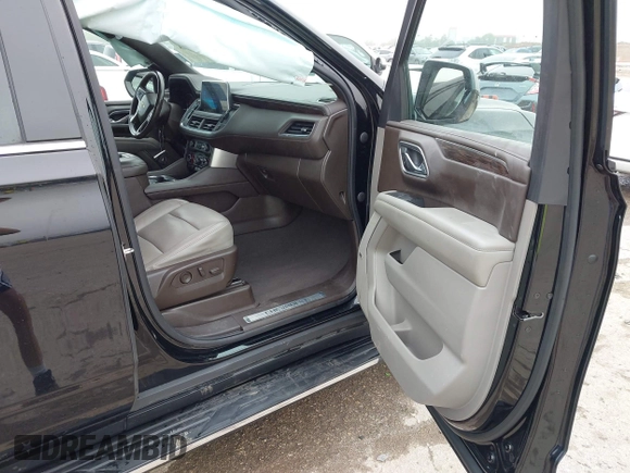 2021 Chevrolet Tahoe LT with VIN 1GNSCNKDXMR172381, listed as a IAAI auction lot 42168263 with 89,112 mi miles and . Bid and sale history available at DreamBid. Image 5.