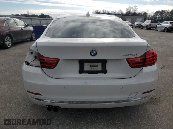 2016 BMW 4 Series 428i with VIN WBA4A9C57GGL87882, listed as a Copart auction lot 84609184 with 139,959 mi miles and Salvage title. Bid and sale history available at DreamBid. Image 6.