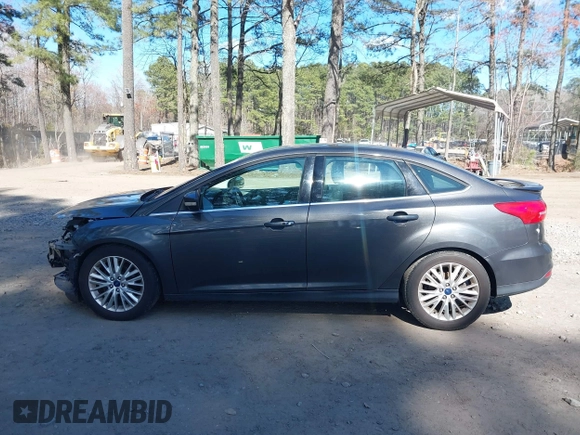 2015 Ford Focus Titanium with VIN 1FADP3J25FL333743, listed as a IAAI auction lot 41857057 with 120,917 mi miles and . Bid and sale history available at carsss.com. Image 15.