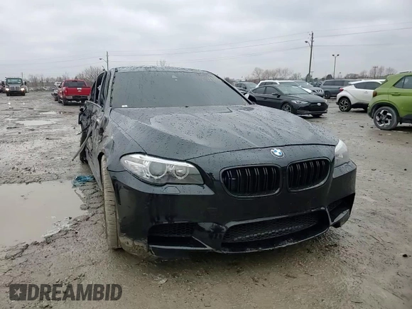 2014 BMW M5 z VIN WBSFV9C59ED097862, wystawiony jako Copart lot #85719684 z przebiegiem Nie podano mil oraz Szkody całkowita. Historia ofert i sprzedaży dostępna na DreamBid. Obrazek 11.