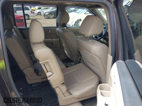 2013 Honda Pilot EX-L with VIN 5FNYF4H6XDB058237, listed as a IAAI auction lot 41898198 with 143,518 mi miles and . Bid and sale history available at carsss.com. Image 8.