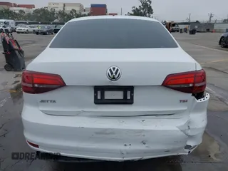 2016 Volkswagen Jetta Sedan 1.4T S w/Technology with VIN 3VW267AJ6GM237619, listed as a IAAI auction lot 41878297 with 124,887 mi miles. Bid and sale history available at carsss.com. Image 16.