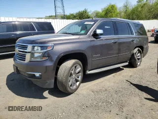 2015 Chevrolet Tahoe LTZ z VIN 1GNSKCKC4FR607574, wystawiony jako Copart lot #54602085 z przebiegiem 125 923 mil mil oraz Szkoda całkowita • Salvage title. Historia ofert i sprzedaży dostępna na DreamBid. Obrazek 1.