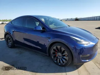 2021 Tesla Model Y Performance with VIN 5YJYGDEF0MF262336, listed as a Copart auction lot 60618534 with 29,242 mi miles and Salvage Title. Bid and sale history available at DreamBid. Image 4.