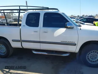 2001 Toyota Tundra SR5 with VIN 5TBRN341X1S166076, listed as a IAAI auction lot 41611961 with 177,097 mi miles and . Bid and sale history available at DreamBid. Image 13.