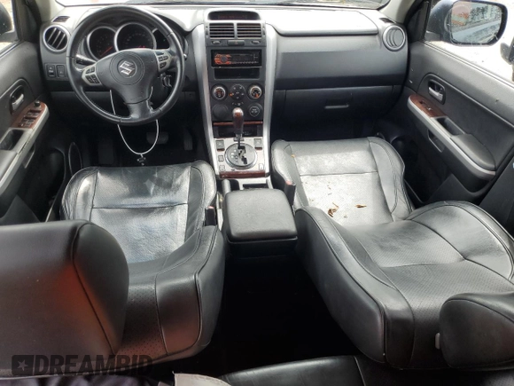 2006 Suzuki Grand Vitara Luxury z VIN JS3TE947164101951, wystawiony jako Copart lot #70110914 z przebiegiem 304 718 mil mil oraz Szkoda całkowita • Salvage title. Historia ofert i sprzedaży dostępna na DreamBid. Obrazek 8.
