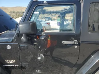 2015 Jeep Wrangler Sahara with VIN 1C4AJWBG5FL733795, listed as a Copart auction lot 61998255 with 86,655 mi miles and Salvage title. Bid and sale history available at DreamBid. Image 7.