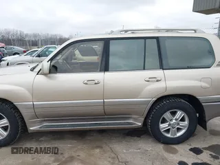 1999 Lexus LX 470 z VIN JT6HT00W8X0045705, wystawiony jako IAAI lot #42005587 z przebiegiem 443 758 mil mil oraz . Historia ofert i sprzedaży dostępna na DreamBid. Obrazek 14.