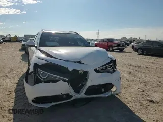 2022 Alfa Romeo Stelvio Sprint z VIN ZASPAKANXN7D28081, wystawiony jako Copart lot #70625994 z przebiegiem Nie podano mil oraz Szkody całkowita. Historia ofert i sprzedaży dostępna na DreamBid. Obrazek 11.