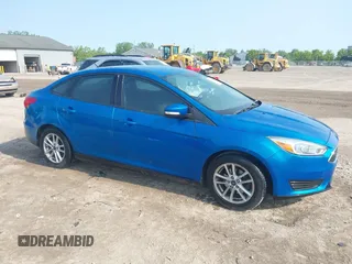 2015 Ford Focus SE with VIN 1FADP3F25FL230220, listed as a IAAI auction lot 42390242 with 75,410 mi miles and . Bid and sale history available at DreamBid. Image 1.